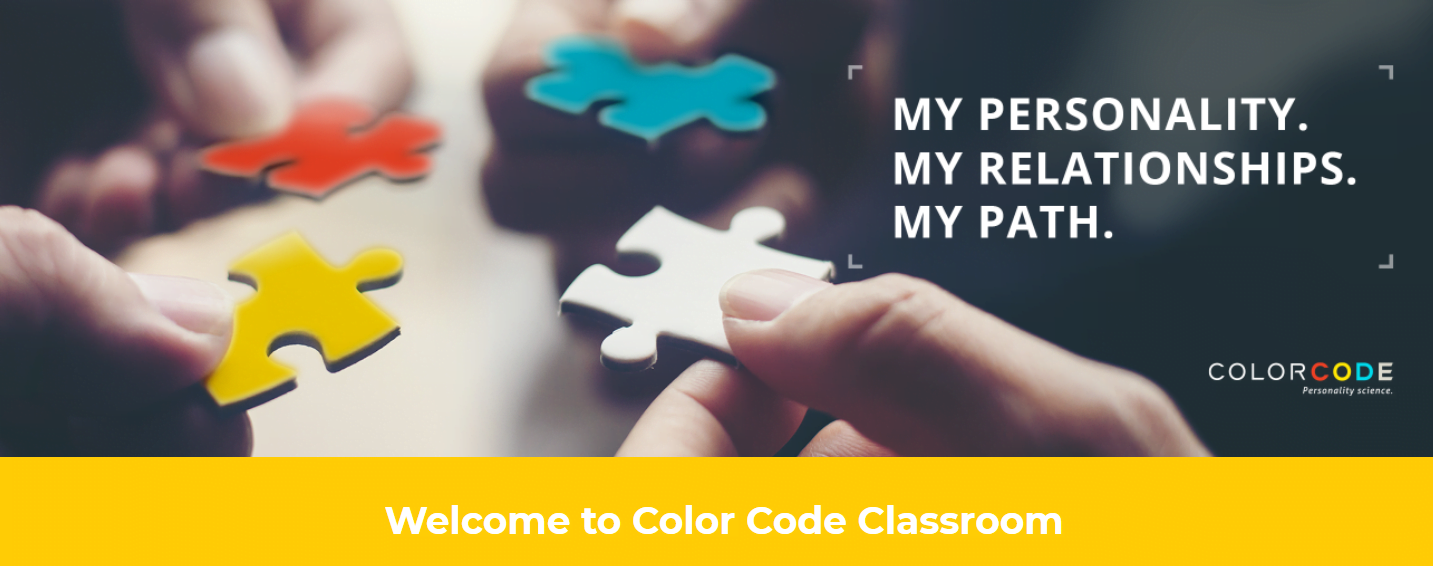 Website of Color Code Classroom with an image of hands holding four puzzle pieces