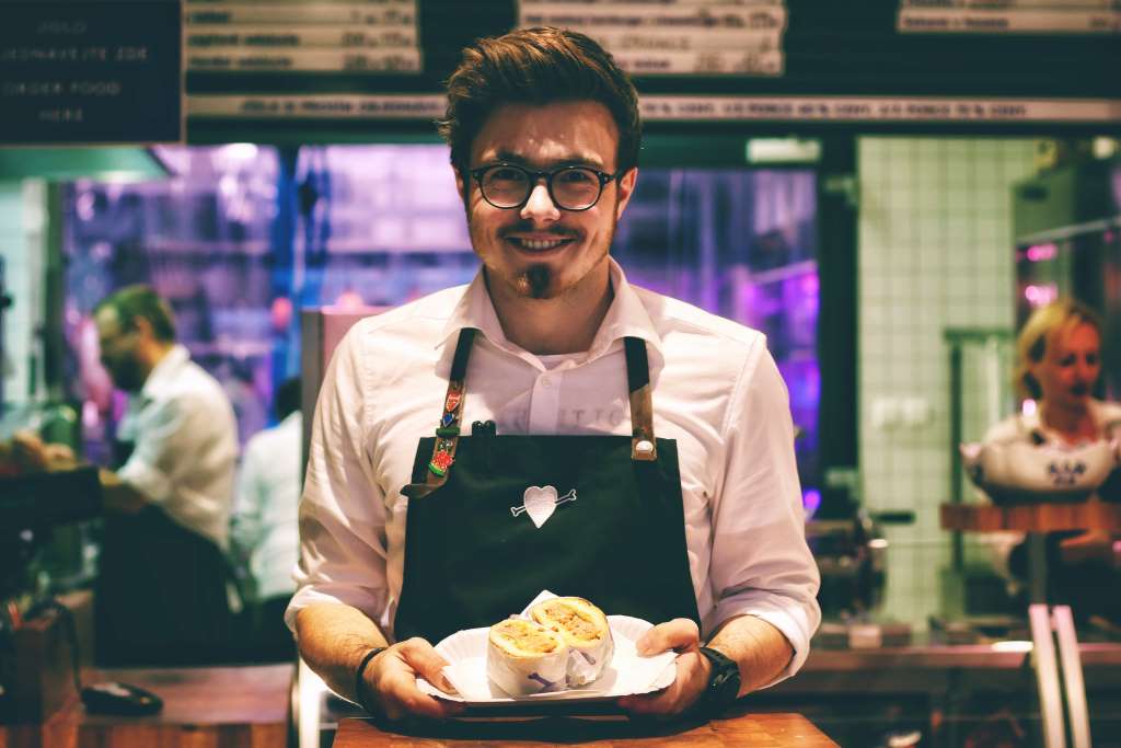 smiling waiter.