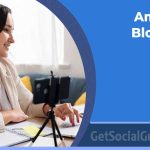 Amateur blogger in a cozy home office writing their first blog post on a laptop.