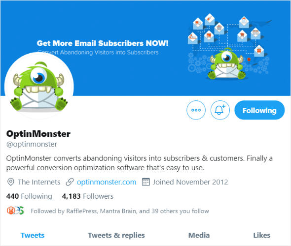 OptinMonster Twitter profile with logo, cover image, bio, and website link, optimized for monetization