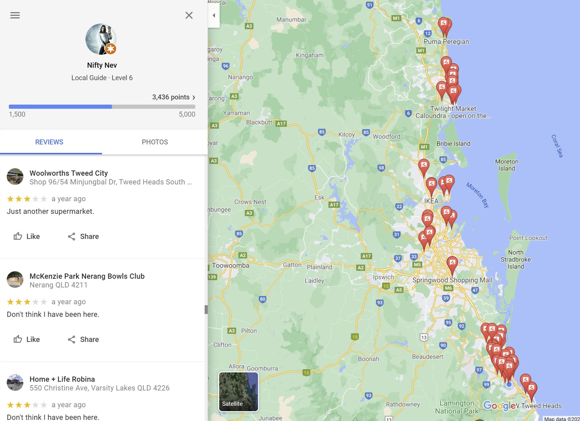 Example of fake reviews from a Google Local Guide showing suspicious patterns